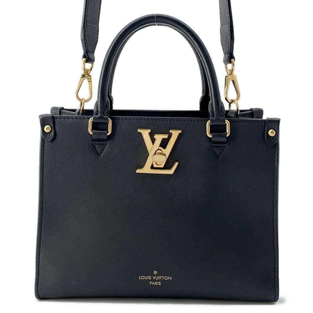 Louis Vuitton handbag grained calf leather Lock Go black bag